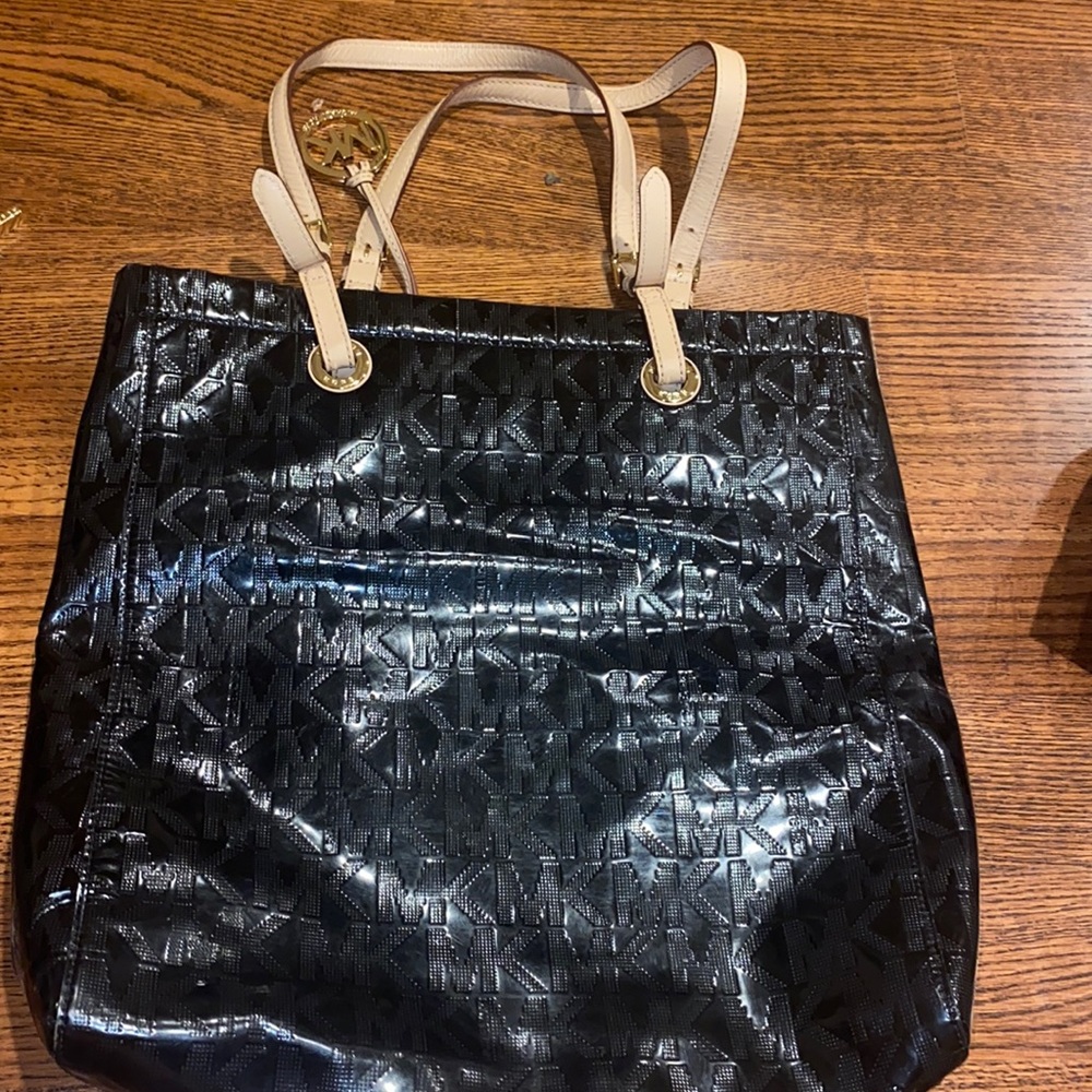 Micheal Khors Leather